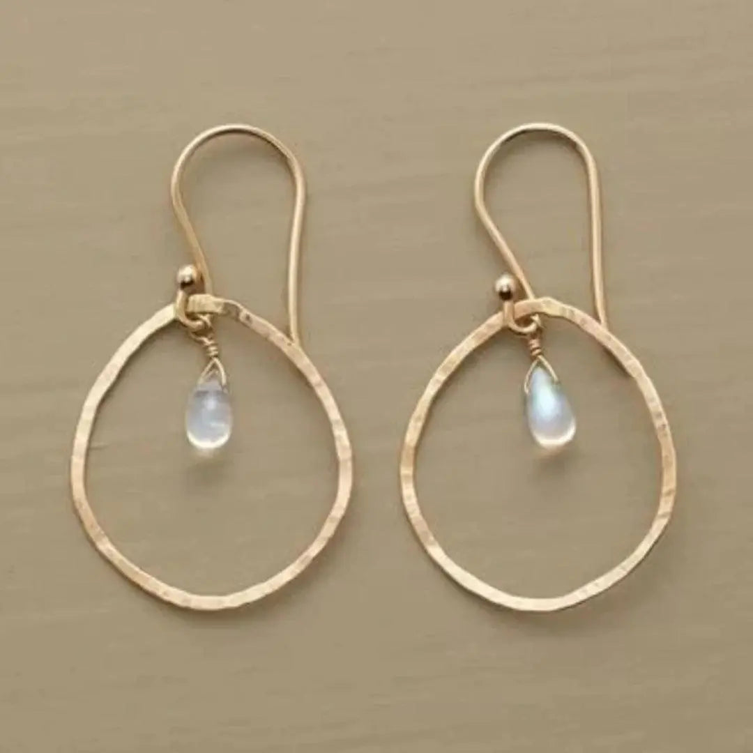 Vintage earrings made of white crystal in gold Unique Joyas
