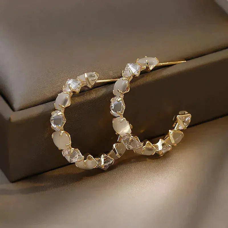 White opal with zirconia earrings in gold Unique Joyas