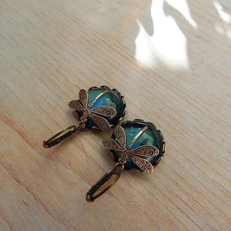 Spherical dragonfly earrings in antique gold Claire Jewelry