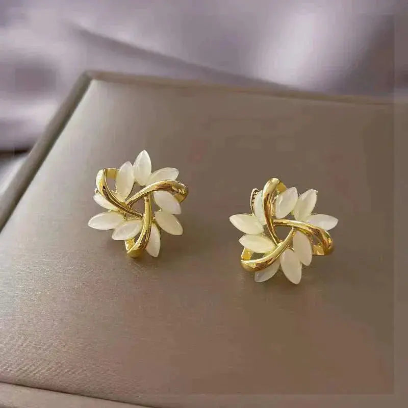 Luxury white opal earrings in gold Claire Jewelry