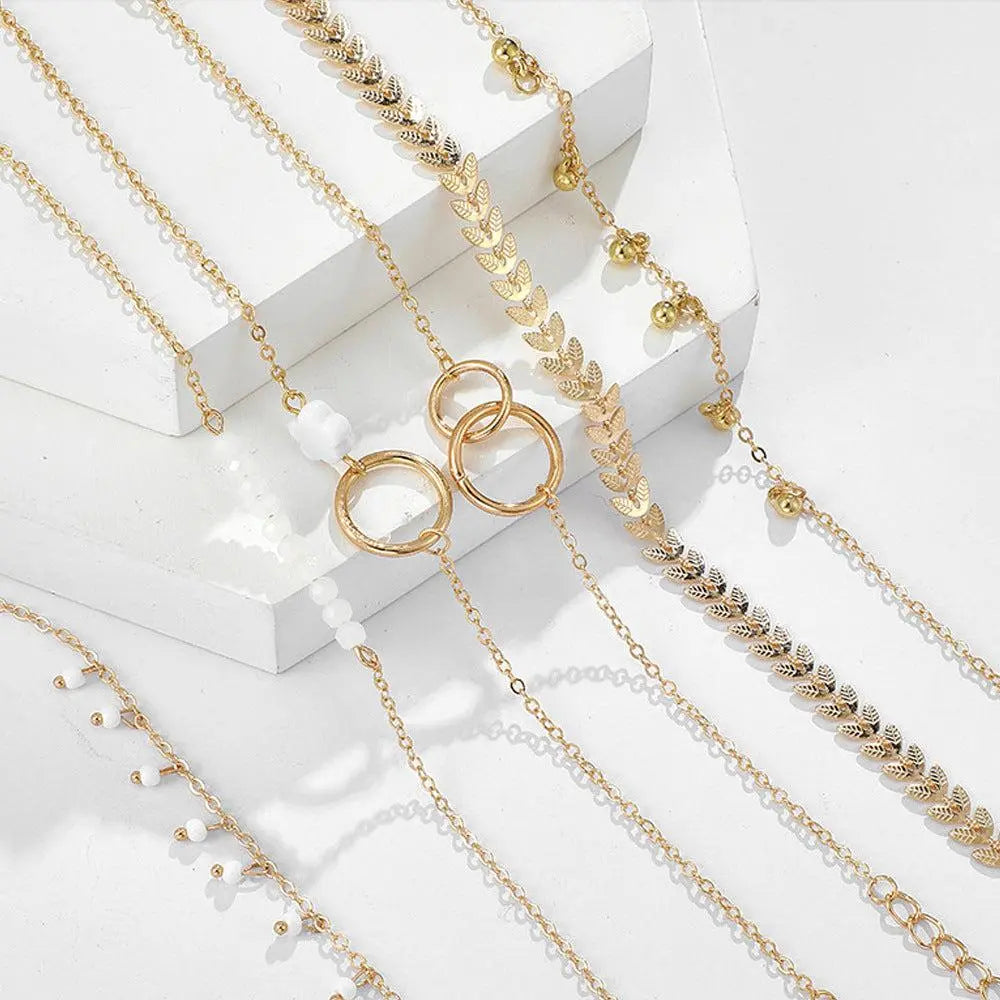 Pack of Boho Bracelets in Gold Unique Joyas
