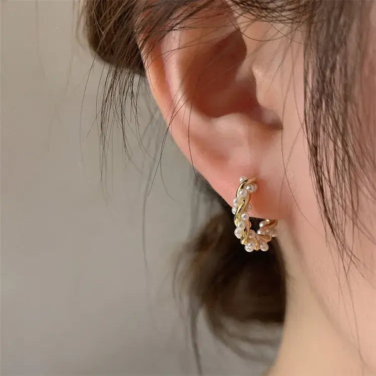 Elegant round pearl earrings with inlays Unique Joyas