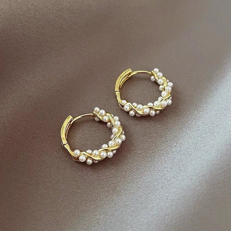 Elegant round pearl earrings with inlays Unique Joyas