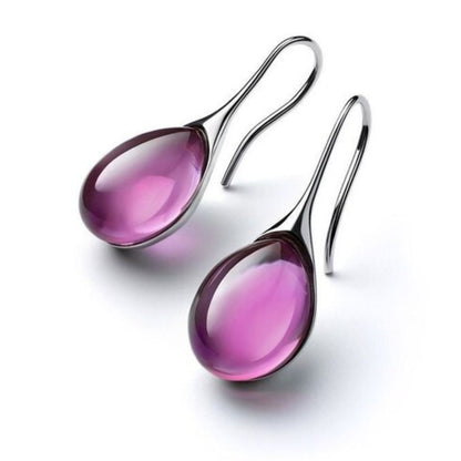 Gold drop earrings with smooth crystal