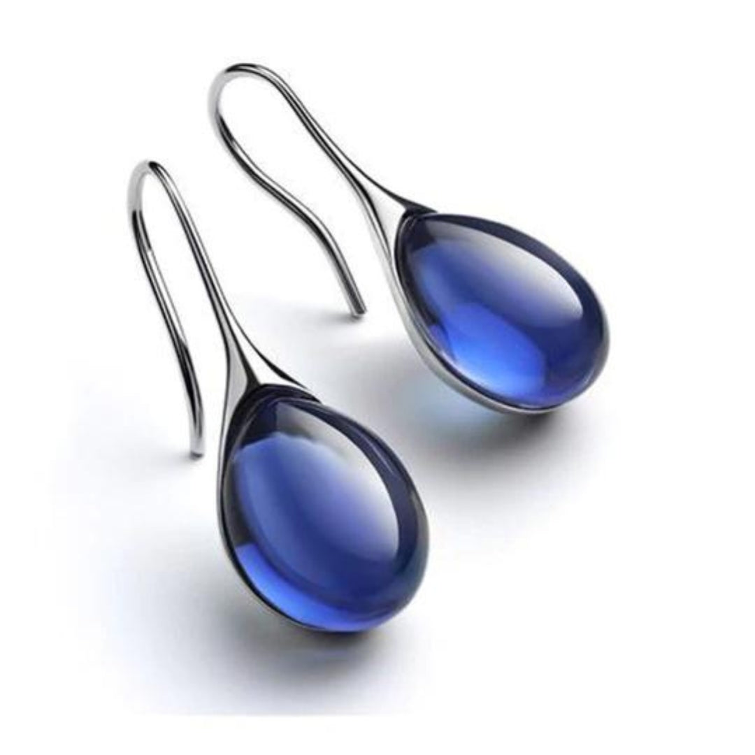 Gold drop earrings with smooth crystal