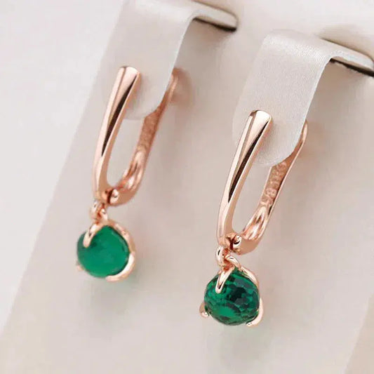 Elegant earrings with green crystals in gold Unique Joyas