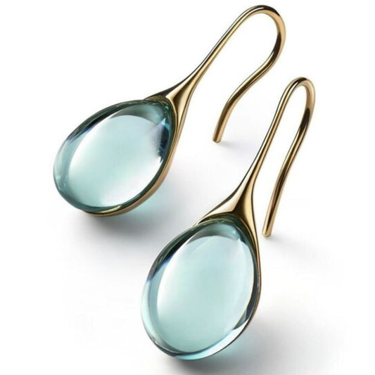 Gold drop earrings with smooth crystal