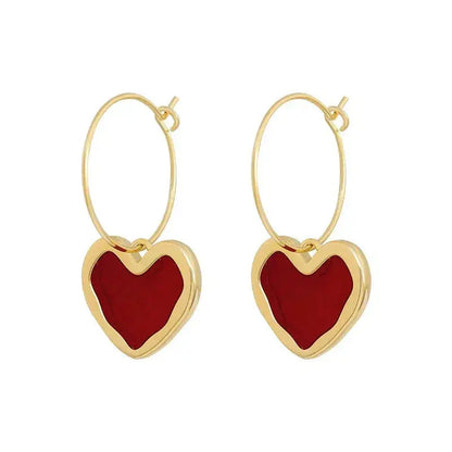 Heart earrings in gold Unique Joyas
