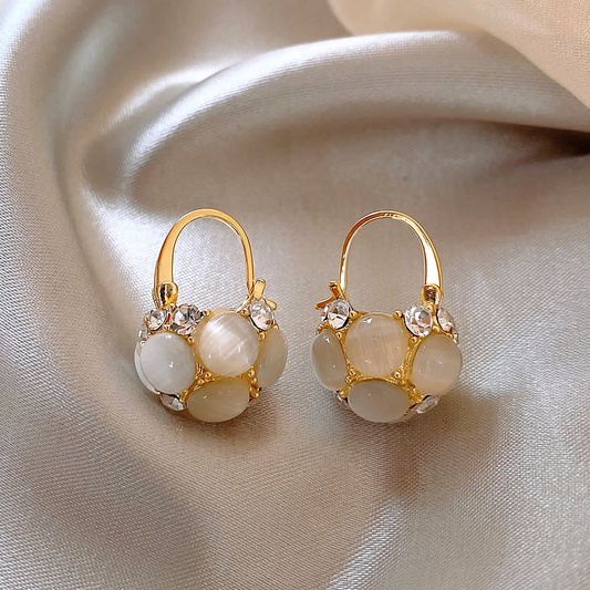 Pearl earrings with golden crystals