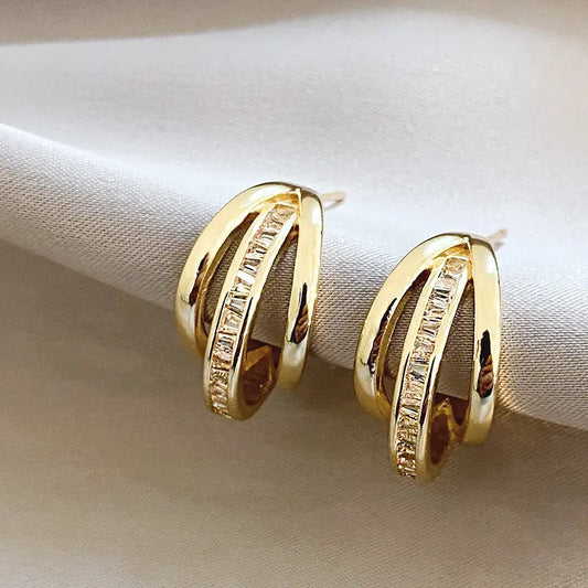 Triple Tire Earrings in Gold Unique Joyas