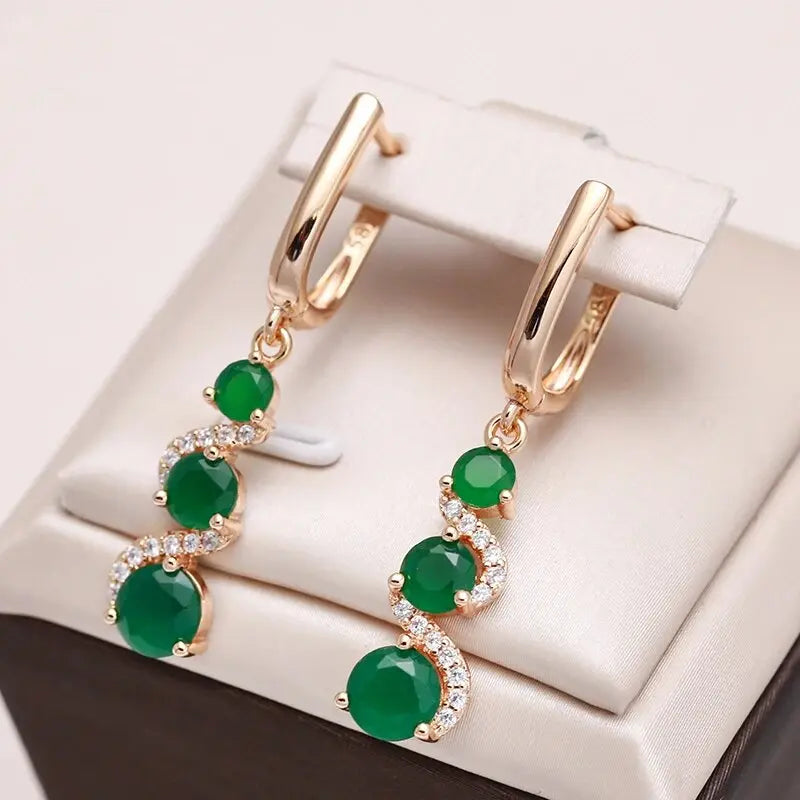 Elegant earrings with golden zirconia Unique Joyas